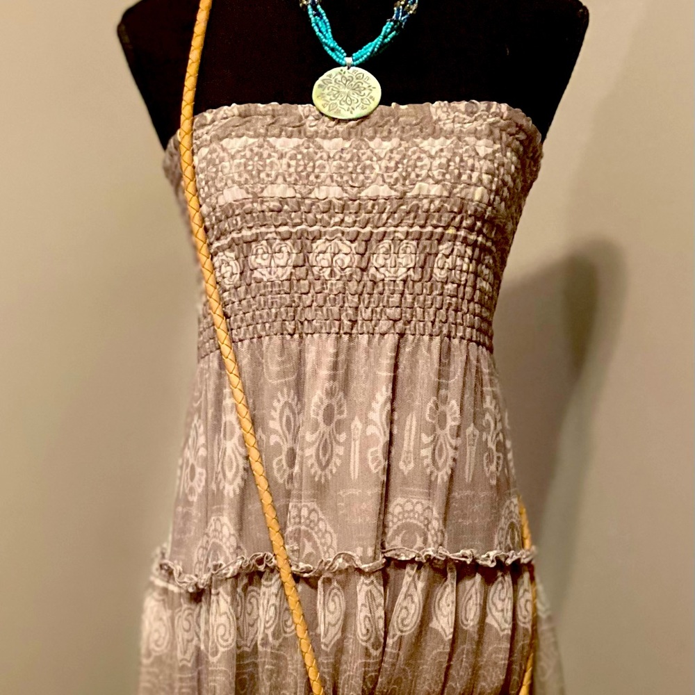 Boho strapless skirt paired with leather crossbody bag and beaded necklace
